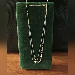 Gold toned petite double chain necklace asymmetrical style